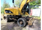 Колесный экскаватор CAT 318, макс. опции